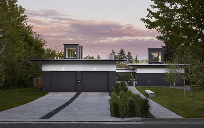 Modern house with garage and minimalist landscaping