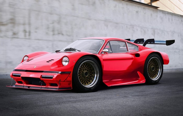 Red Ferrari Dino race car with a large rear spoiler