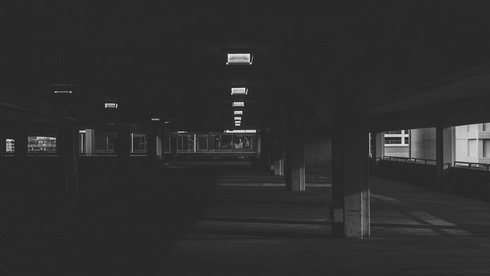 Monochrome image of an empty parking garage