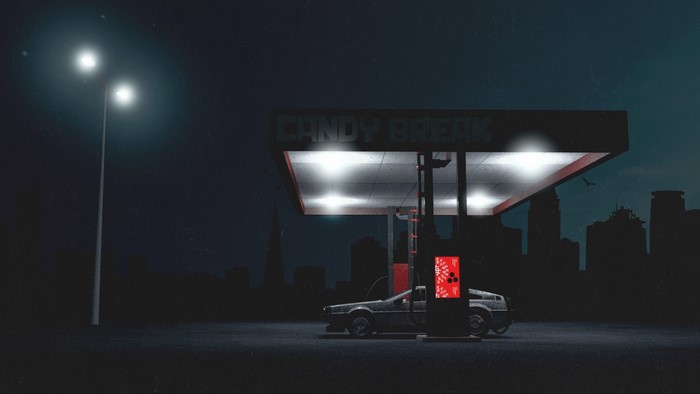 DeLorean at a gas station at night