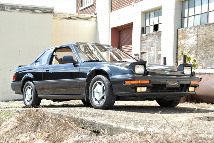 Black Honda Prelude with Pop-up Headlights