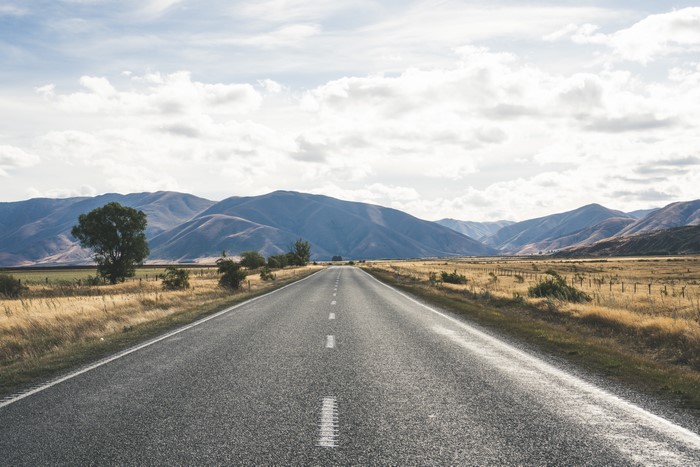 Road through mountains landscape