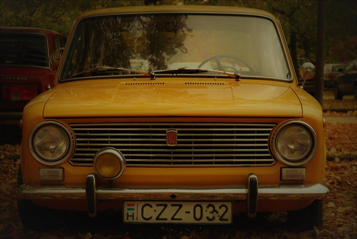 Yellow LADA old school car frontal view Hungary