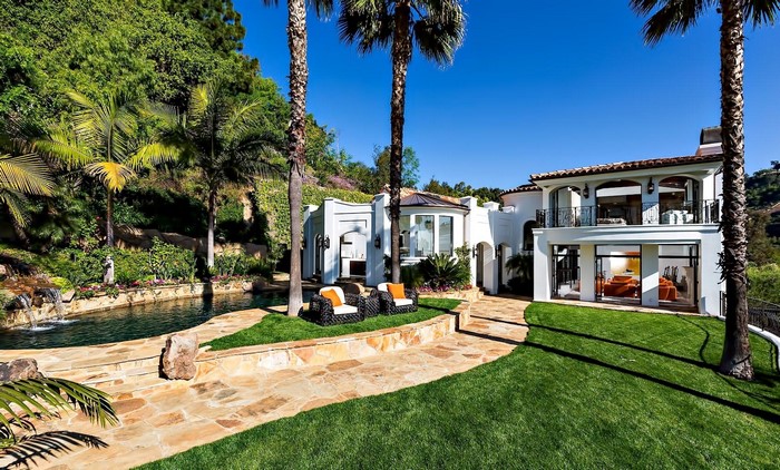 Luxury house with pool and palm trees