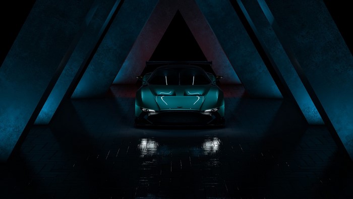 Teal Aston Martin Vulcan in dark triangular structure