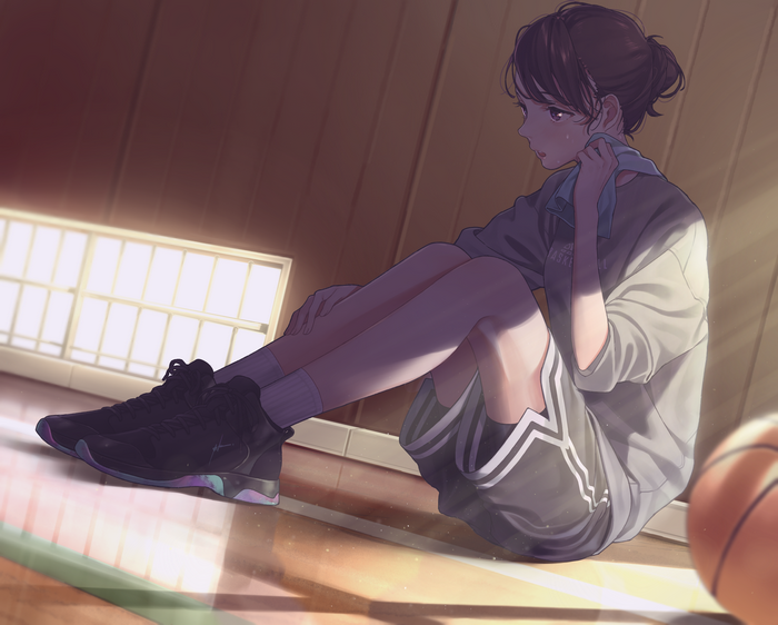 Anime girl in sportswear sitting on a basketball court