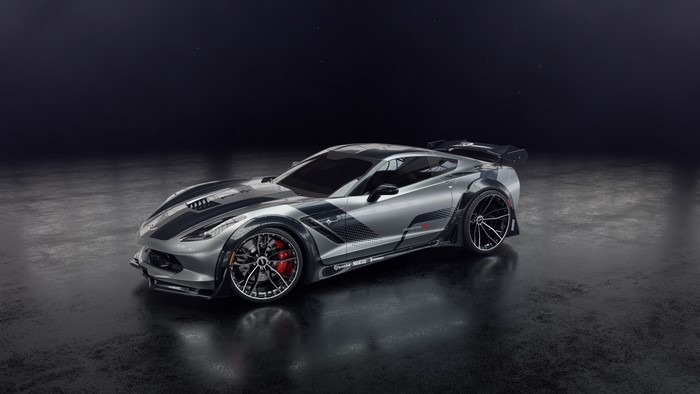Silver Chevrolet Corvette with racing stripes