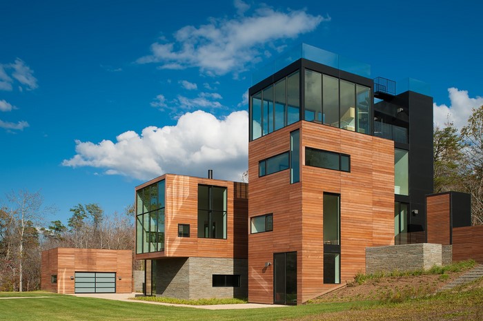 Modern wooden house with glass elements