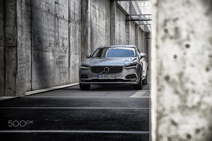 Silver Volvo V90 CC parked in concrete tunnel