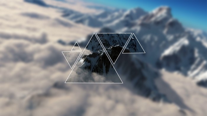 Geometric overlay on snowy mountains above clouds