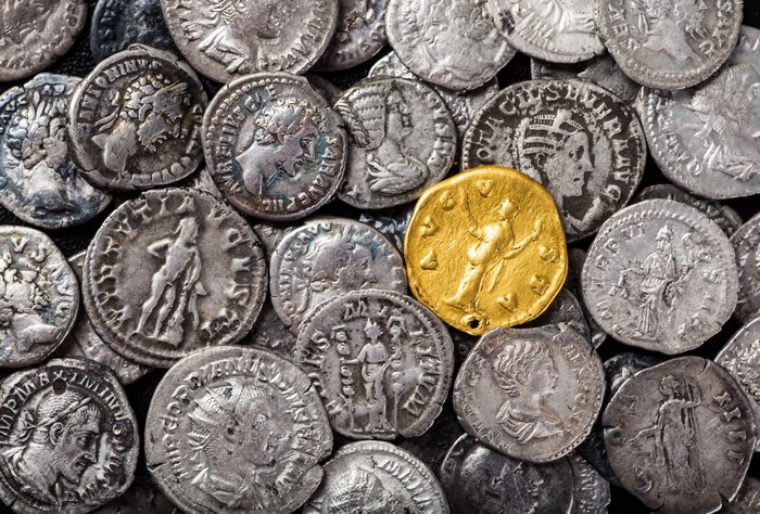 A collection of ancient gold and silver Roman coins