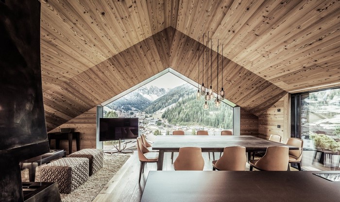 Modern wooden interior with mountain view dining room