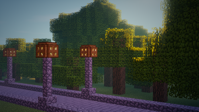 Minecraft path with lanterns and trees