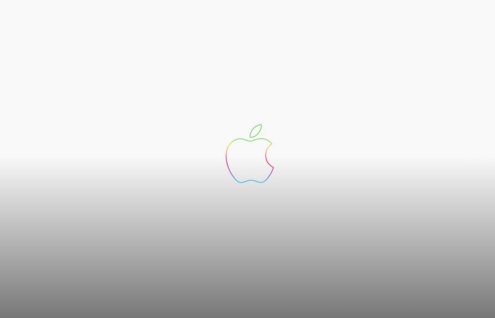 Apple logo with rainbow outline on gradient background