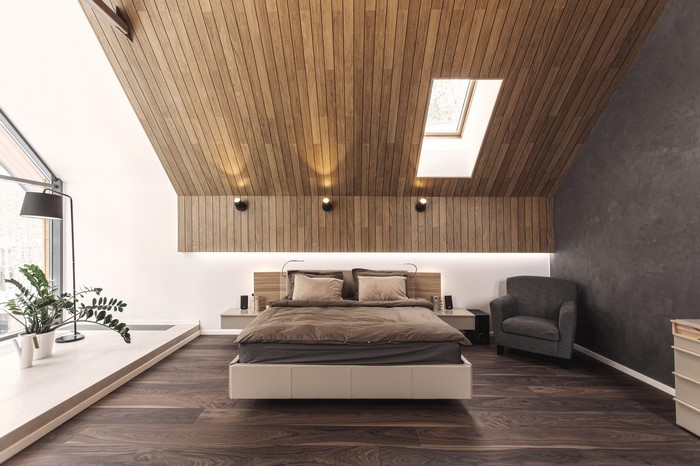 Modern bedroom with wooden ceiling and skylight