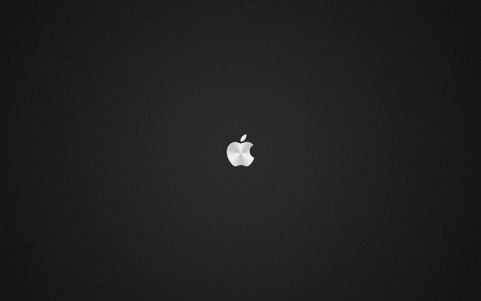 Apple logo on a dark background