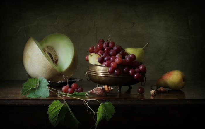 Still life with melon, grapes, and pears