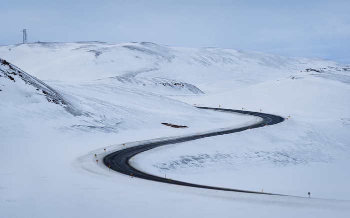 Winding road through a snowy landscape