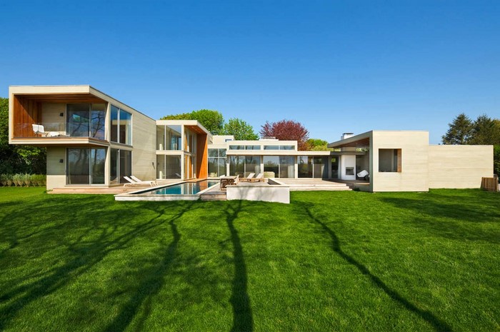 Modern mansion with swimming pool and lawn