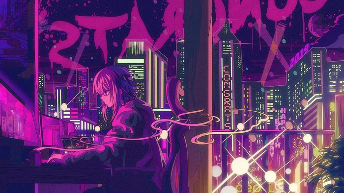 Girl at computer in neon city