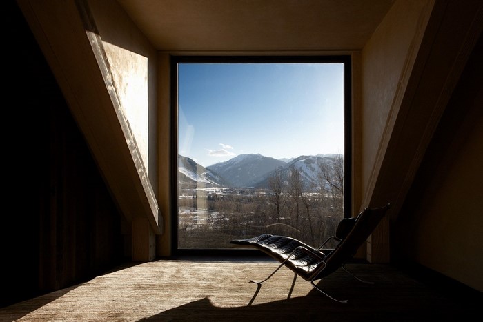 Modern lounge chair with mountain view