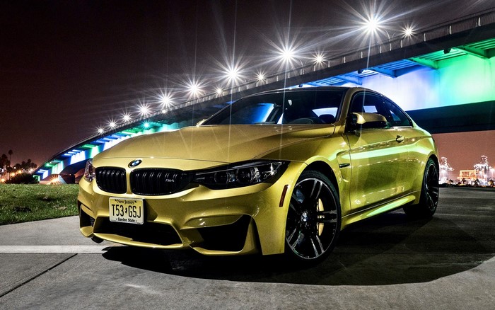Yellow BMW M4 Coupe at Night