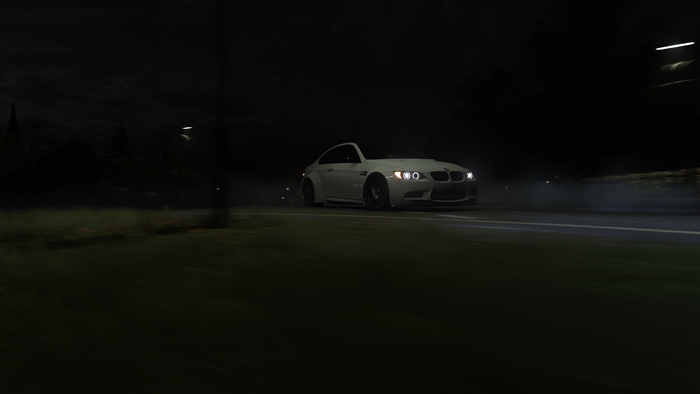 White BMW M3 E92 drifting at night in Forza Horizon 4