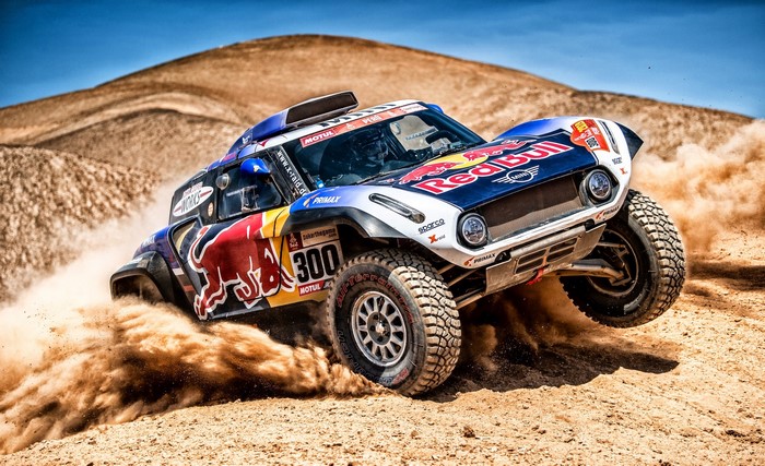Red Bull Mini Rally Car Number 300 Racing in Desert