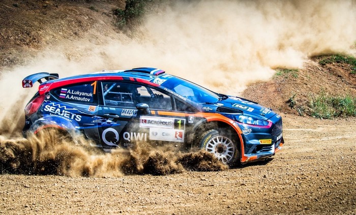 A. Lukyanuk and A. Arnatov Ford Fiesta rally car on dirt track