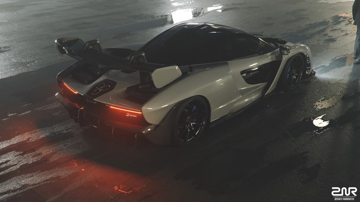 McLaren Senna sports car on wet asphalt