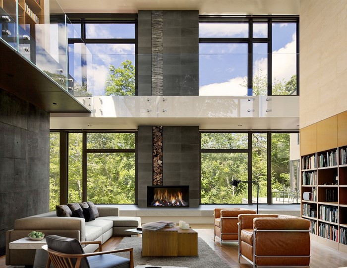 Modern living room with fireplace and large windows