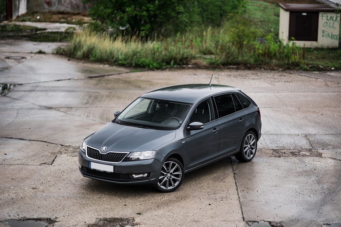 Škoda Rapid car parked on wet concrete