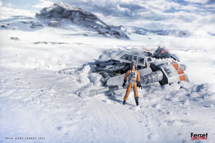 Star Wars Rebel pilot standing by a crashed snowspeeder on Hoth