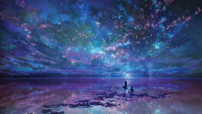 Couple watching a starry sky over a reflective body of water