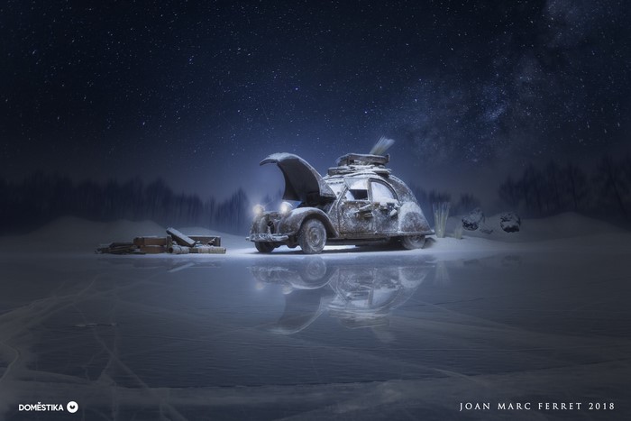 Abandoned car on ice under starry sky