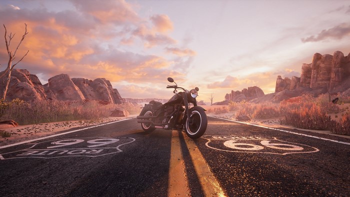 Motorcycle on Route 66 in desert landscape at sunset