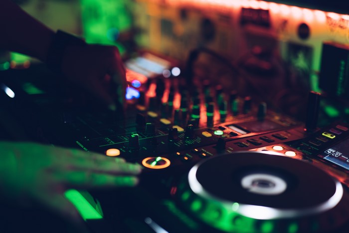 DJ playing music in a nightclub