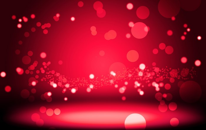 Abstract red bokeh lights on a dark background