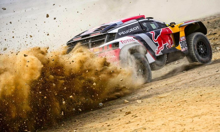 Peugeot Total Rally Car Driving Through Dirt
