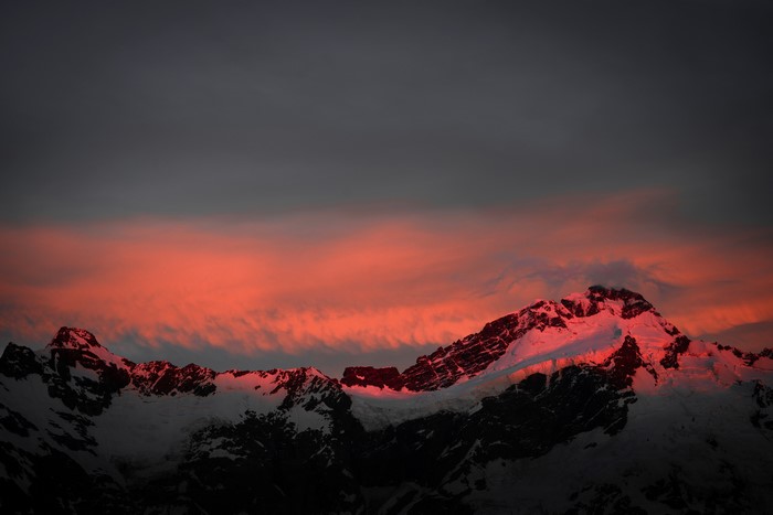 4K sunset over snow-capped mountains