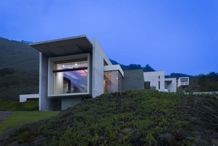 Modern concrete house on a hillside