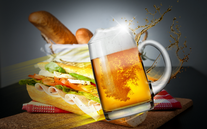 Beer and sandwich with bread basket