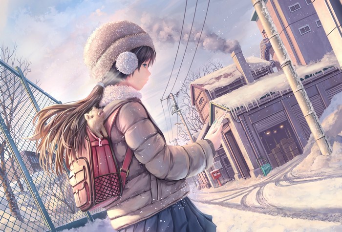 Girl with a pet in a snowy town