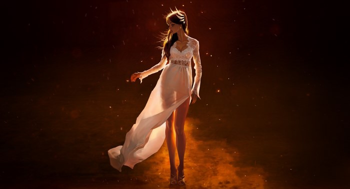 Woman in a white dress standing in fire