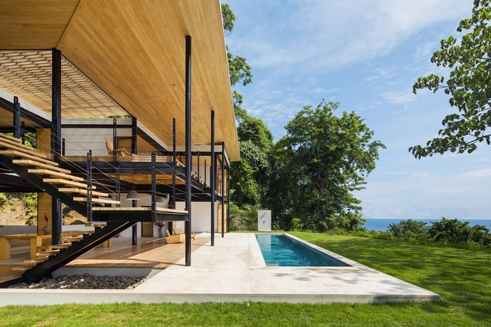 Modern house with swimming pool and ocean view