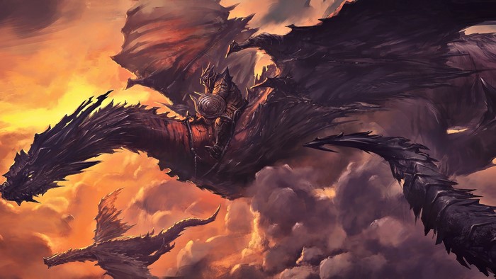 Fantasy art of dragons and a rider in the sky