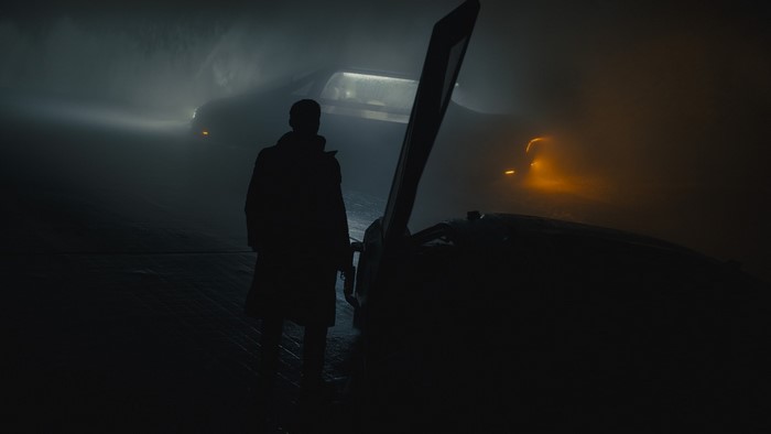 K from Blade Runner 2049 standing by a spinner