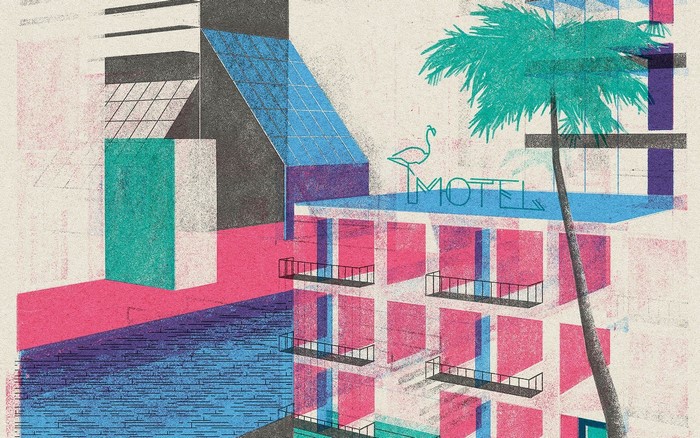 Motel with flamingo sign and palm tree