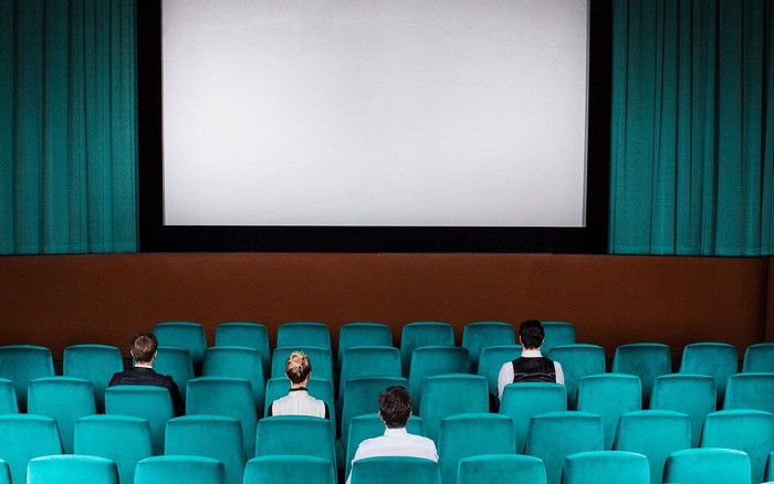 People sitting in a movie theater