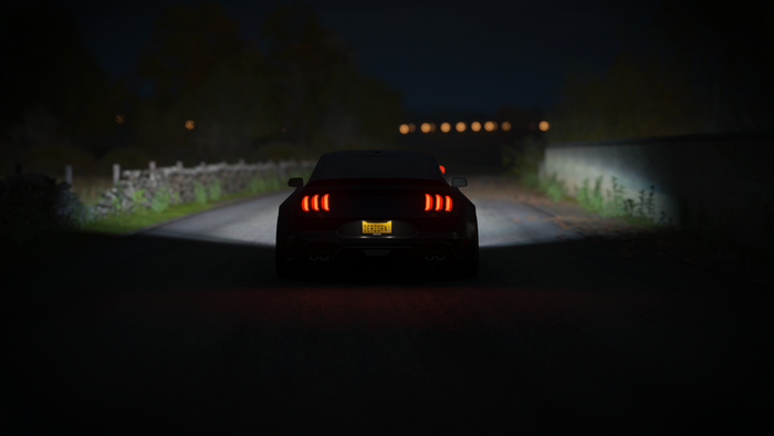 Ford Mustang driving at night in Forza Horizon 4